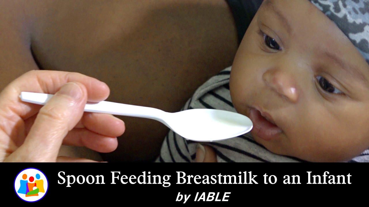 Spoon Feeding Breastmilk to an Infant